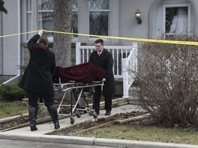 Toronto Police remove the body of a senior from a home on Hertford Ave., near Keele St. and Eglinton Ave. W., Monday April 15, 2019.
