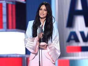 Kacey Musgraves accepts the award for female artist of the year at the 54th annual Academy of Country Music Awards at the MGM Grand Garden Arena on Sunday, April 7, 2019, in Las Vegas.