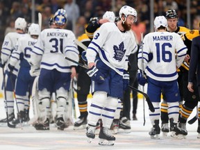 Defenceman Jake Muzzin reacts after the Maple Leafs lost 5-1 to the Boston Bruins on Tuesday night.