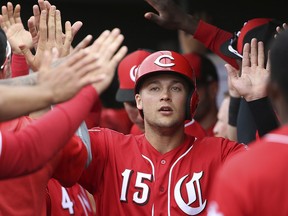 In this Monday, March 11, 2019 file photo, Cincinnati Reds' Nick Senzel (15) celebrates during a spring training game in Goodyear, Ariz. (AP Photo/Ross D. Franklin, File)