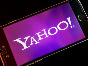 In this Dec. 15, 2016, file photo, the Yahoo logo appears on a smartphone in Frankfurt, Germany.