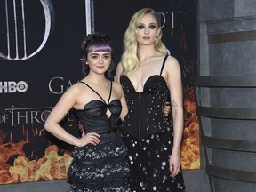 Maisie Williams, left, and Sophie Turner attend HBO's "Game of Thrones" final season premiere at Radio City Music Hall on Wednesday, April 3, 2019, in New York.