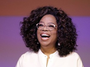 Oprah Winfrey smiles during a tribute to Nelson Mandela and promoting gender equality event at University of Johannesburg in Soweto, South Africa, Thursday, Nov. 29, 2018.