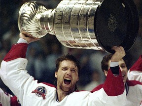 Patrick Roy holds the Stanley Cup aloft after the Montreal Canadiens won the Stanley Cup in 1993.