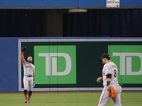 Giants’ Kevin Pillar salutes the crowd from centre field during the first inning on Tuesday night in Toronto.