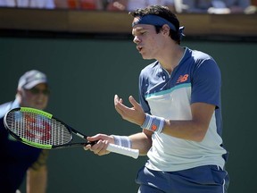 Milos Raonic reacts to losing a point to Dominic Thiem during their match at the BNP Paribas Open Saturday, March 16, 2019, in Indian Wells, Calif. (AP Photo/Mark J. Terrill)