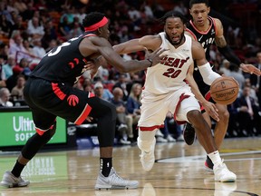 Miami Heat forward Justise Winslowdrives to the basket as Toronto Raptors forward Pascal Siakam defends during the second half of an NBA basketball game, Sunday, March 10, 2019, in Miami.
