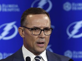 In this Feb. 26, 2018, file photo, Tampa Bay Lightning general manager Steve Yzerman gestures during a news conference before an NHL hockey game against the Toronto Maple Leafs, in Tampa, Fla.