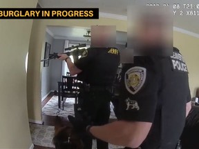 Police body camera video shows Washington County Sheriff’s Office deputies responding to a report of a suspected robber in a bathroom that ended up being a robot vacuum cleaner. (Washington County Sheriff's Office)