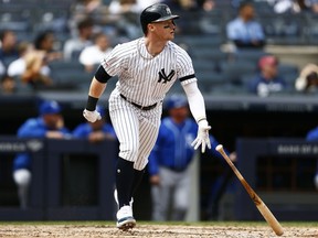 New York Yankees' Clint Frazier watches his three-run home run during the fifth inning of a baseball game against the Kansas City Royals on Sunday, April 21, 2019, in New York.