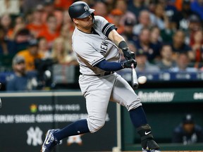 Gary Sanchez of the New York Yankees doubles in two runs in the sixth inning against the Houston Astros at Minute Maid Park on April 9, 2019 in Houston, Texas.