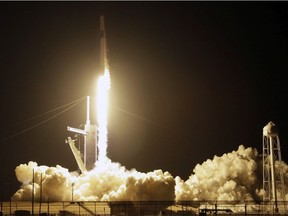 A SpaceX Falcon 9 rocket with a demo Crew Dragon spacecraft lifts off from pad 39A on an uncrewed test flight to the International Space Station at the Kennedy Space Center in Cape Canaveral, Fla., Saturday, March 2, 2019.