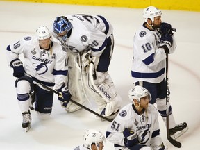 Tampa Bay Lightning players show their dejection after losing the Stanley Cup final to Chicago in 2015. (AP Photo/Charles Rex Arbogast)