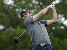 Corey Conners hits his drive on the second hole during the third round of the Texas Open golf tournament, Saturday, April 6, 2019, in San Antonio.