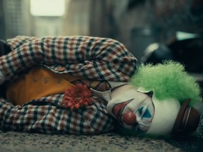 Joaquin Phoenix plays the Joker in this screengrab taken from the teaser trailer of "The Joker." (Warner Bros./YouTube screengrab)