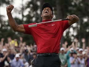 Tiger Woods reacts as he wins the Masters Sunday, April 14, 2019, in Augusta, Ga. (AP Photo/David J. Phillip)
