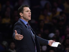Los Angeles Lakers coach Luke Walton gestures during the team's game against the Portland Trail Blazers on Tuesday, April 9, 2019, in Los Angeles.