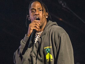 This March 3, 2018 file photo shows Travis Scott performing at the Okeechobee Music and Arts Festival on Saturday, March 3, 2018, in Okeechobee, Fla.