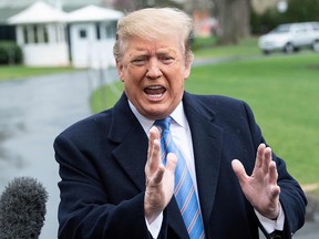 President Donald Trump speaks to the press as he departs the White House in Washington, DC, on April 5, 2019. (NICHOLAS KAMM/AFP/Getty Images)
