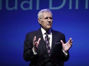 Moderator Alex Trebek speaks during a gubernatorial debate between Democratic Gov. Tom Wolf and Republican Scott Wagner in Hershey, Pa., on October 1, 2018. "Jeopardy!" host Alex Trebek says he's "feeling good" as he continues cancer therapy and is already working on the next season of the hit quiz show. In a new video posted on the "Jeopardy!" YouTube page, the Sudbury, Ont.-born TV personality is seen on the show's set, where he notes it's the last day of taping for the 35th anniversary season.