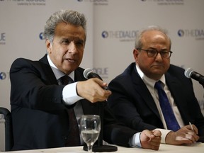 Ecuador's President Lenin Moreno, left, speaks at an event at the Inter-American Dialogue think tank, Tuesday, April 16, 2019, in Washington.