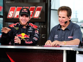 Brian Vickers talks with Darrell Waltrip as he appears on "Trackside Live" on SPEED at Richmond International Raceway on May 1, 2009 in Richmond, Virginia. (Rusty Jarrett/Getty Images for NASCAR)