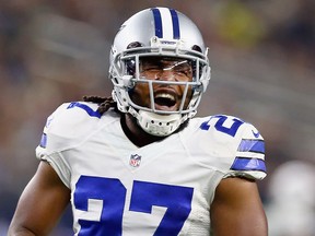 J.J. Wilcox of the Dallas Cowboys reacts against the New York Jets in the first half at AT&T Stadium on Dec. 19, 2015 in Arlington, Texas.