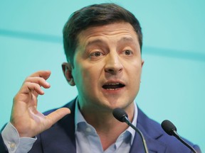 Ukrainian comedian and presidential candidate Volodymyr Zelenskiy speaks to his supporters at his headquarters after the second round of presidential elections in Kiev, Ukraine, Sunday, April 21, 2019.