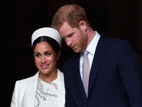 In this file photo taken on March 11, 2019 Britain's Prince Harry, Duke of Sussex (R) and Meghan, Duchess of Sussex leave after attending a Commonwealth Day Service at Westminster Abbey in central London.