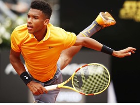 Felix Auger-Aliassime of Canada serves during his first round match agains Borna Coric of Croatia during day two of the International BNL d'Italia at Foro Italico on May 13, 2019 in Rome, Italy.