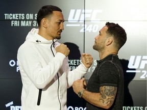 UFC featherweight champion Max Holloway (left) and contender Frankie Edgar square off during a press conference at Rogers Place in Edmonton, on Wednesday, May 29, 2019. UFC 240: Holloway Vs. Edgar takes place Saturday, July 27 at Rogers Place.