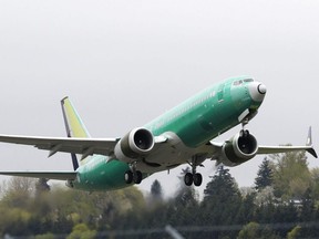 In this April 10, 2019 file photo, a Boeing 737 Max 8 airplane being built for India-based Jet Airways, takes off on a test flight at Boeing Field in Seattle.