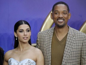 British actress Naomi Scott and U.S. actor Will Smith pose on arrival for the European Gala of Aladdin in central London on May 9, 2019.