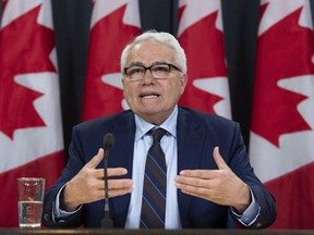 Official Languages Commissioner Raymond Theberge responds to a question during a news conference in Ottawa, Thursday, May 9, 2019.
