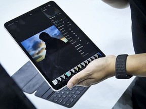 An iPad Pro is reviewed after an event announcing new products Tuesday Oct. 30, 2018, in the Brooklyn borough of New York.