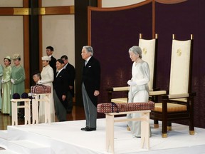 Japan's Emperor Akihito, second from right, accompanied by Empress Michiko, attends the ceremony of his abdication in front of other members of the royal families and top government officials at the Imperial Palace in Tokyo, Tuesday, April 30, 2019. The 85-year-old Akihito ends his three-decade reign on Tuesday as his son Crown Prince Naruhito will ascend the Chrysanthemum throne on Wednesday. (Japan Pool via AP)