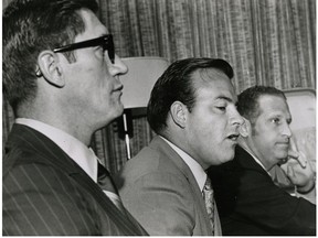 Then St. Louis Blues coach Al Arbour, left, and general manager Scotty Bowman, centre, are pictured on Sept. 11, 1970.