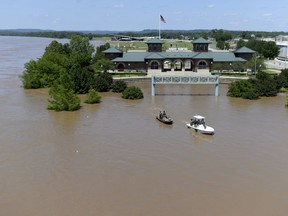 The Arkansas River floods Harry E. Kelley River Park in Fort Smith, Ark., Thursday, May 30, 2019.