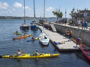 The waterfront boardwalk is seen in Halifax on Aug. 5, 2017. A new study says the population of the three Maritime provinces is growing at its fastest pace in decades, thanks mainly to immigration and a reduced outflow to Alberta.