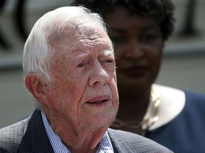 In this Sept. 18, 2018 file photo, former President Jimmy Carter speaks during a news conference, in Plains, Ga.