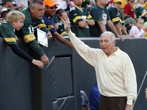 In this Sept. 10, 2012, file photo, former Green Bay Packers quarterback Bart Starr waves to fans during the Packers' game against the San Francisco 49ers in Green Bay, Wis. (AP Photo/Jeffrey phelps, File)