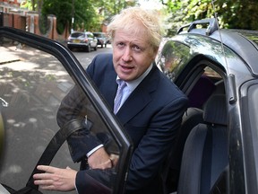 In this file photo taken on May 28, 2019 Conservative MP Boris Johnson leaves his residence in south London. (DANIEL LEAL-OLIVAS/AFP/Getty Images)