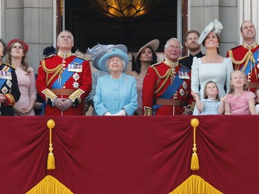 In this Saturday, June 9, 2018 file photo, from left, Princess Anne, Princess Beatrice, Prince Andrew, Queen Elizabeth, Meghan, Duchess of Sussex, Prince Charles, Prince Harry, Kate, Duchess of Cambridge and Prince William attend the annual Trooping the Colour Ceremony in London.