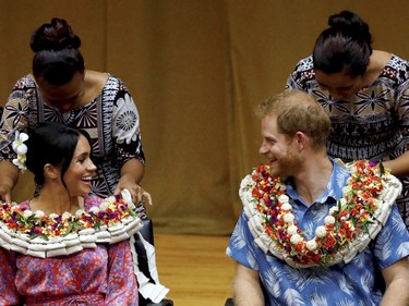 In this Wednesday, Oct. 24, 2018 file photo, Prince Harry and Meghan, Duchess of Sussex visit the University of the South Pacific in Suva, Fiji.