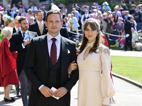 Patrick J. Adams and wife Troian Bellisario arrive a for the wedding ceremony of Prince Harry and Meghan Markle at St. George's Chapel in Windsor Castle in Windsor, near London, England, Saturday, May 19, 2018.