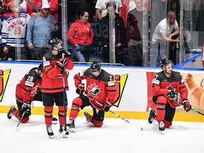 Canada's players react after losing the world championship final to Finland on May 26, 2019 in Bratislava. (JOE KLAMAR/AFP/Getty Images)