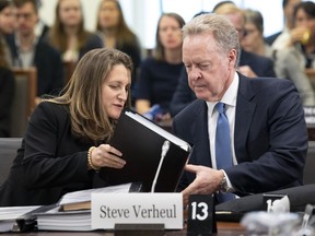 Foreign Affairs Minister Chrystia Freeland speaks with Steve Verheul, Canada's chief negotiator for NAFTA, prior to appearing before the Standing Committee on Foreign Affairs and International Development in Ottawa, Tuesday May 28, 2019.
