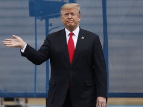 President Donald Trump waves at the crowd at the U.S. Air Force Academy graduation Thursday, May 30, 2019 at Air Force Academy, Colo.