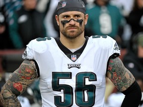 In this Dec. 30, 2018, file photo, Philadelphia Eagles defensive end Chris Long stands on the sideline prior to the team's NFL football game against the Washington Redskins in Landover, Md.