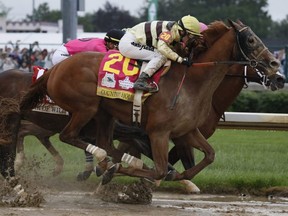 Flavien Prat rides Country House to victory during the 145th running of the Kentucky Derby at Churchill Downs in Louisville, Kentucky, Saturday, May 4, 2019,  Luis Saez on Maximum Security finished first but was later disqualified.